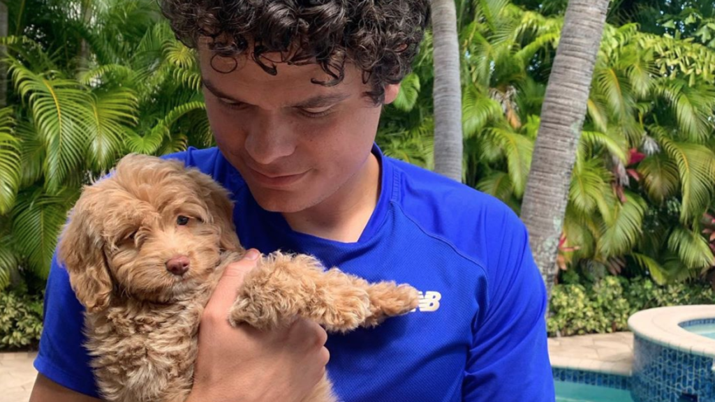 raonic and dog