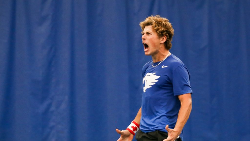 liam draxl celebrates in tennis match