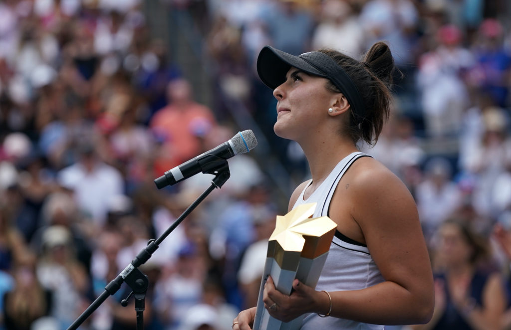 bianca andreescu looks to the crowd after winning rogers cup