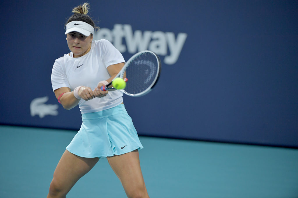 bianca andreescu hits a backhand at the miami open