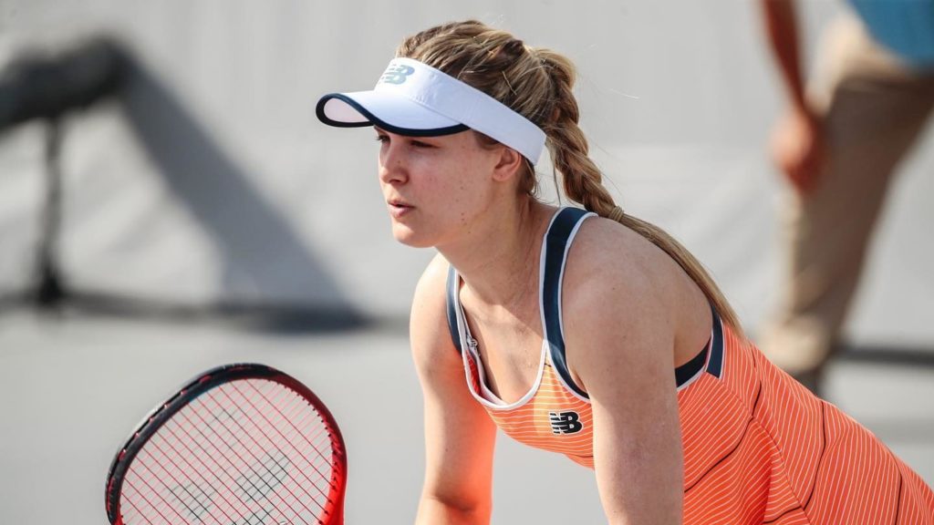 Genie Bouchard holds her racket, ready to return a serve