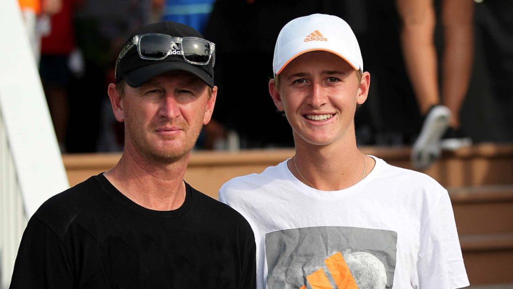 Sebastian Korda and his father Petr posing