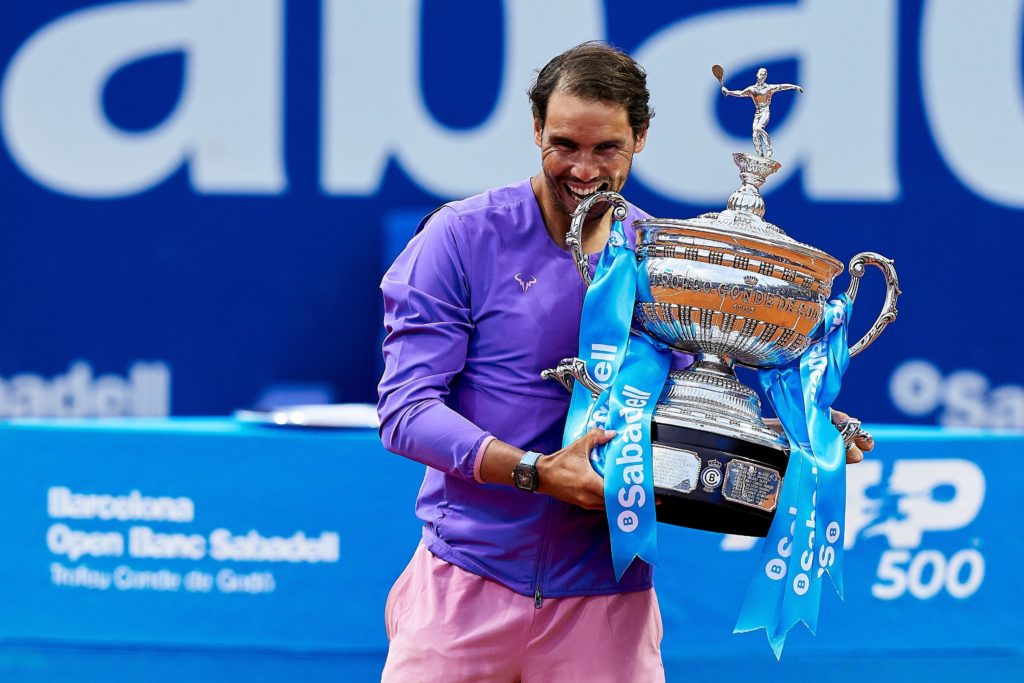nadal holds the barcelona open trophy