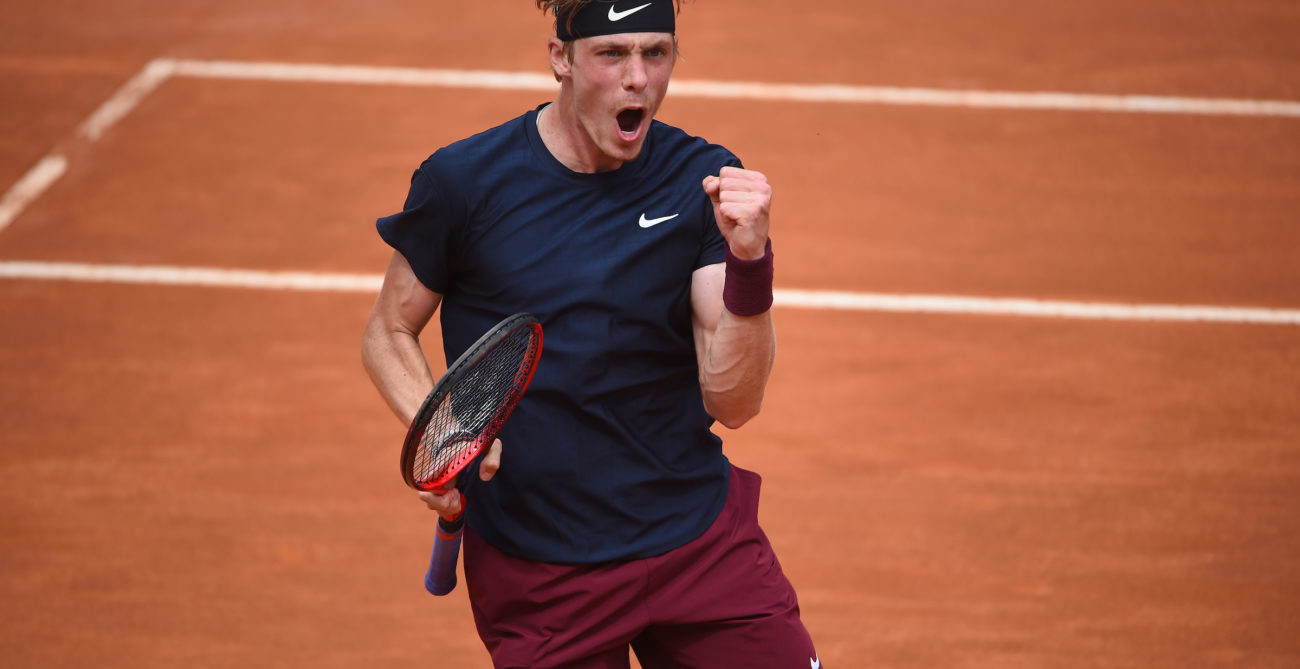 Denis Shapovalov pumps his fist and yells