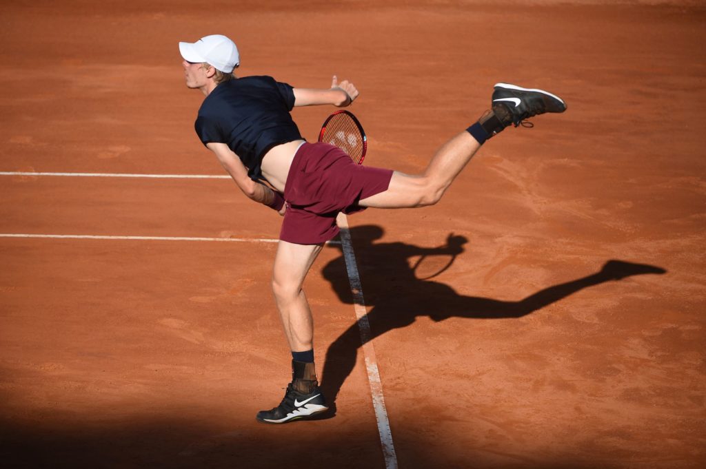 Denis Shapovalov finishes his service motion in Rome