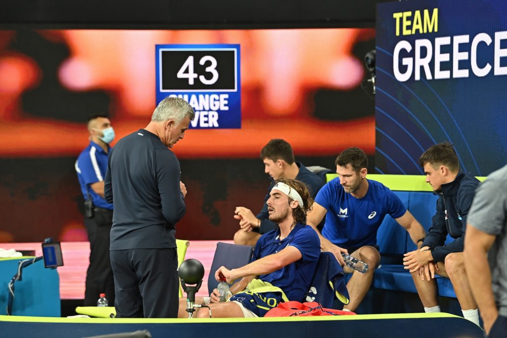 Stefanos Tsitsipas talking to his father and coach Apostolos Tsitsipas