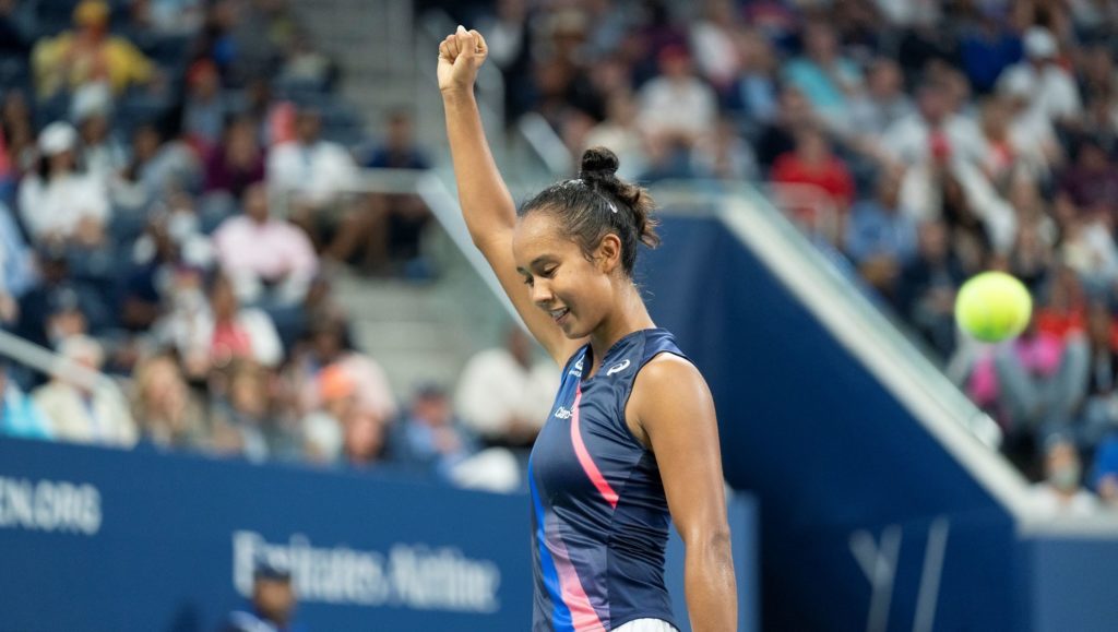 Leylah Fernandez fist in air with crowd in the back