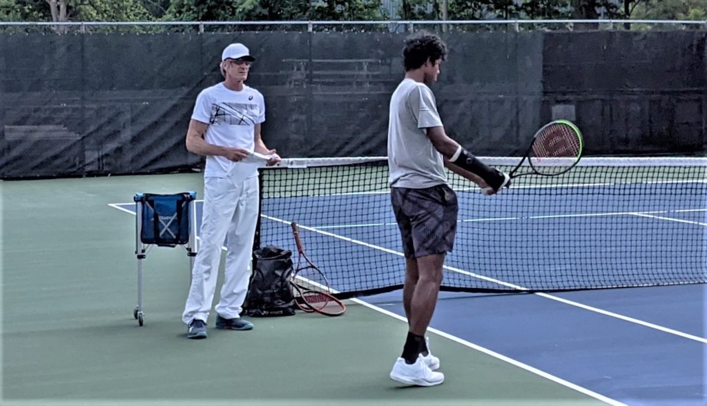 Martin Laurendeau coaching a player