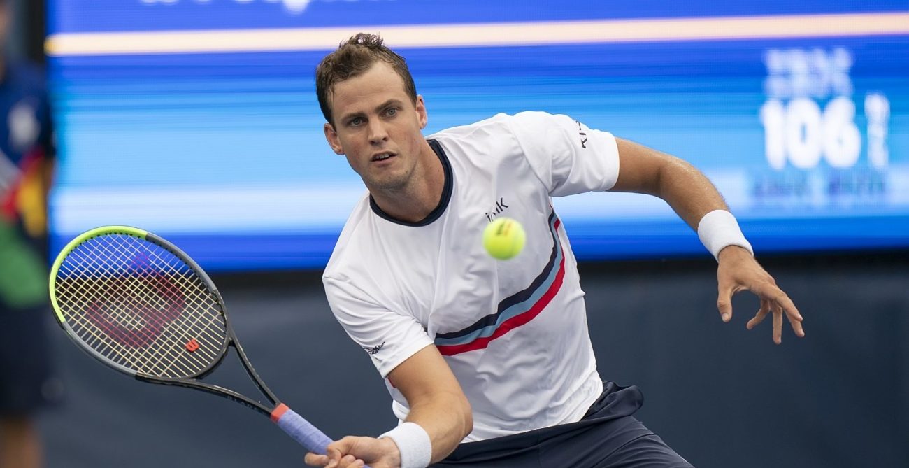 Vasek Pospisil hits a return at the 2021 US Open