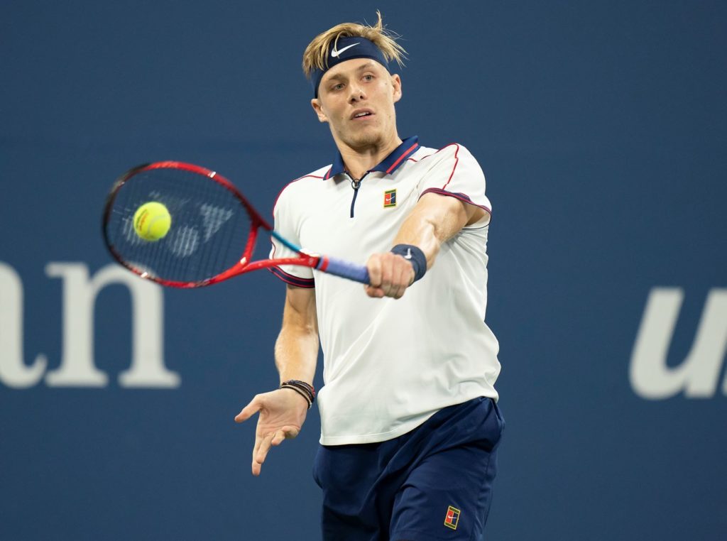 Denis Shapovalov hits a backhand.