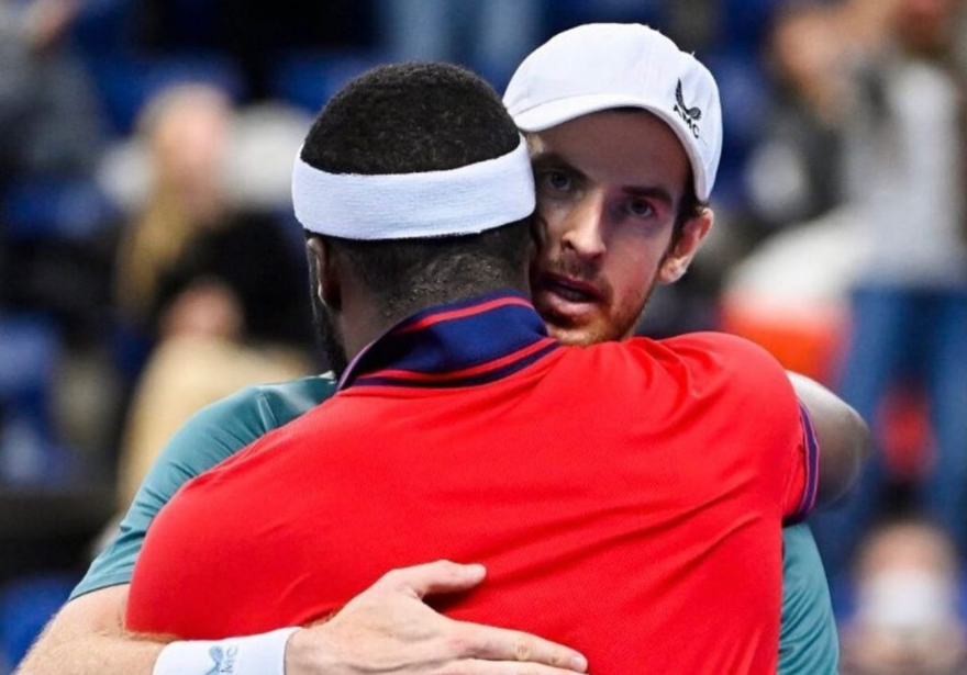 Andy Murray hugs Frances Tiafoe.