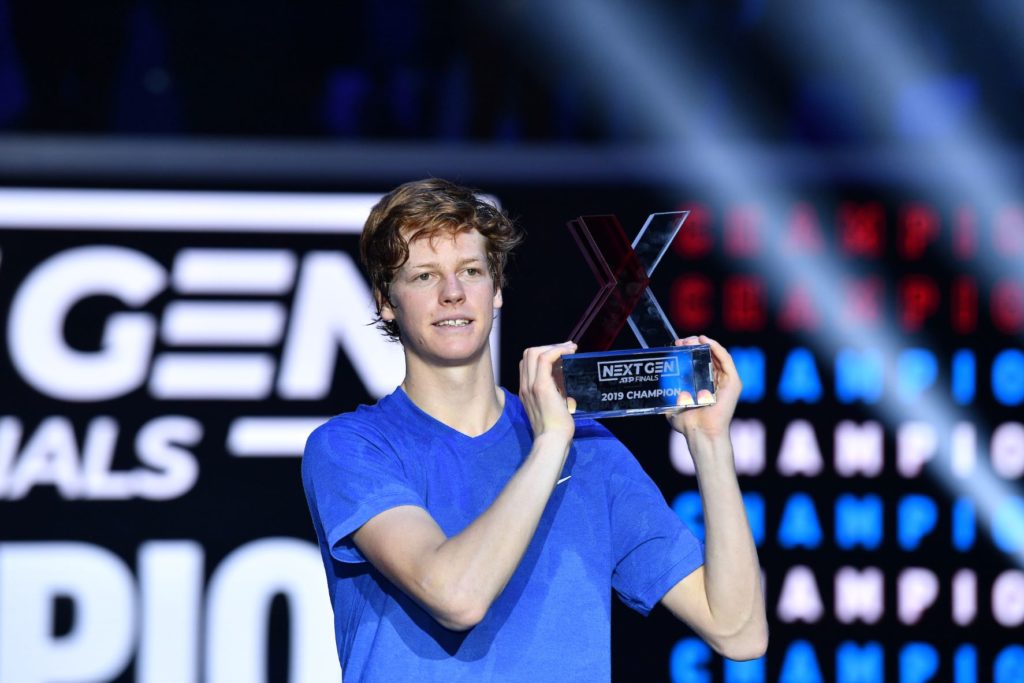Janik Sinner holds the Next Gen Finals trophy