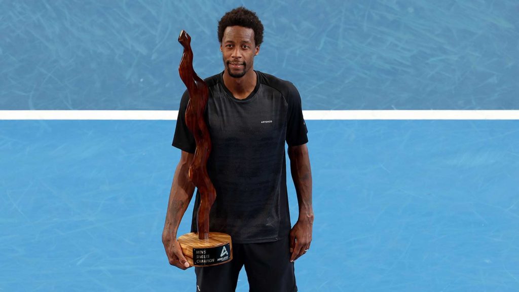 Gael Monfils holding a trophy