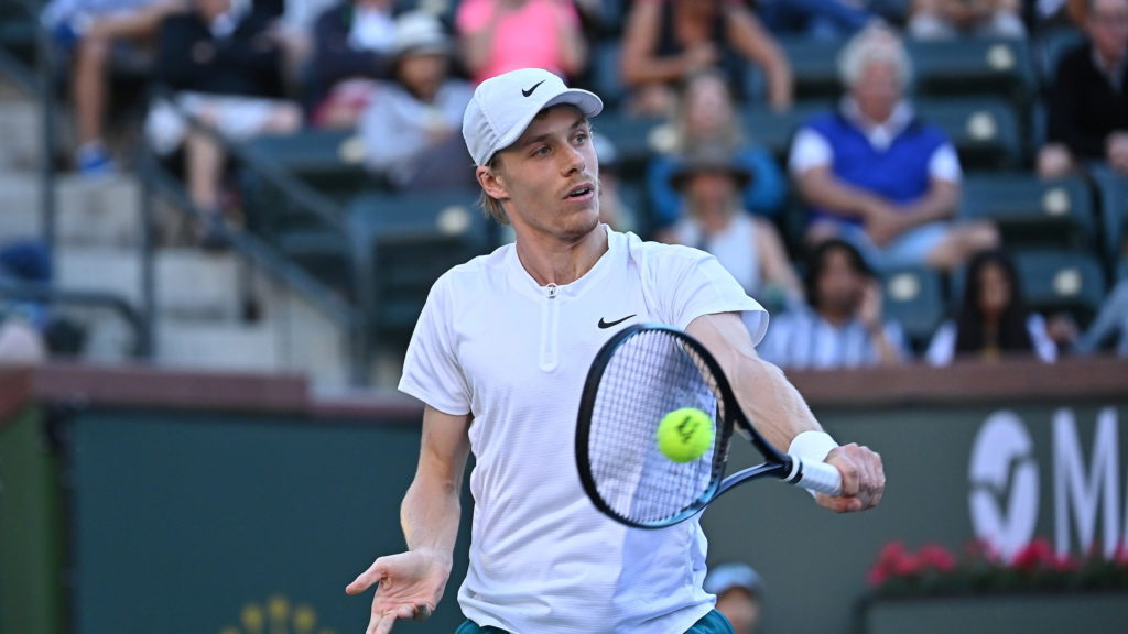Denis Shapovalov hits a backhand.
