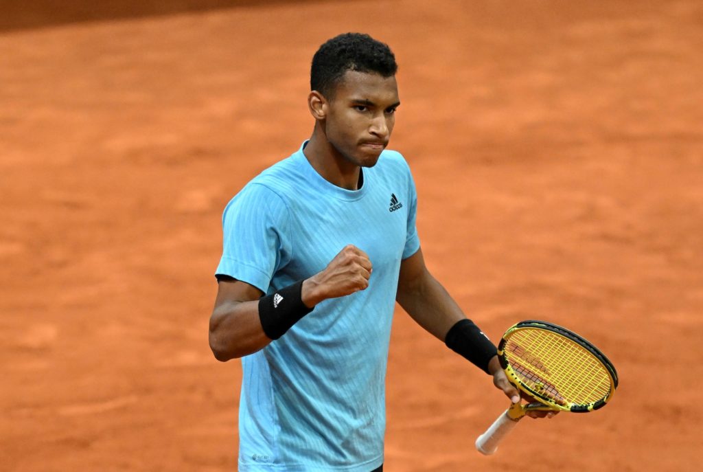 Felix Auger-Aliassime pumps his fist.