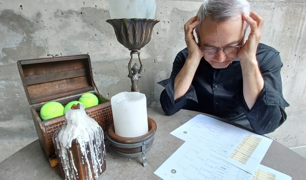 Paul Rivard Sits at the table and thinks
