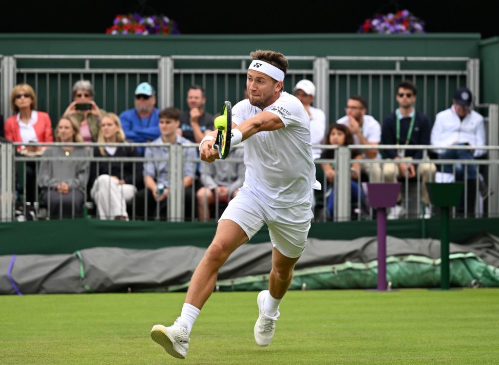 Ruud hitting a backhand