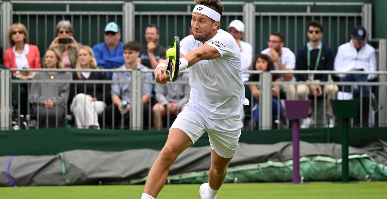 Ruud hitting a backhand