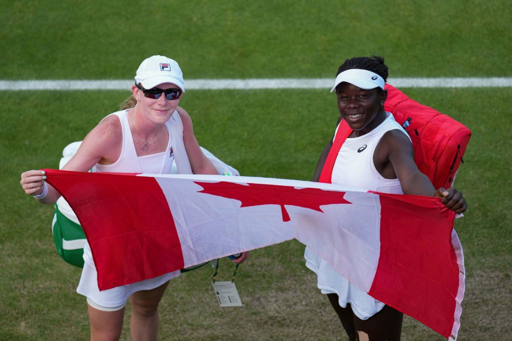 mboko and cross with canada flag