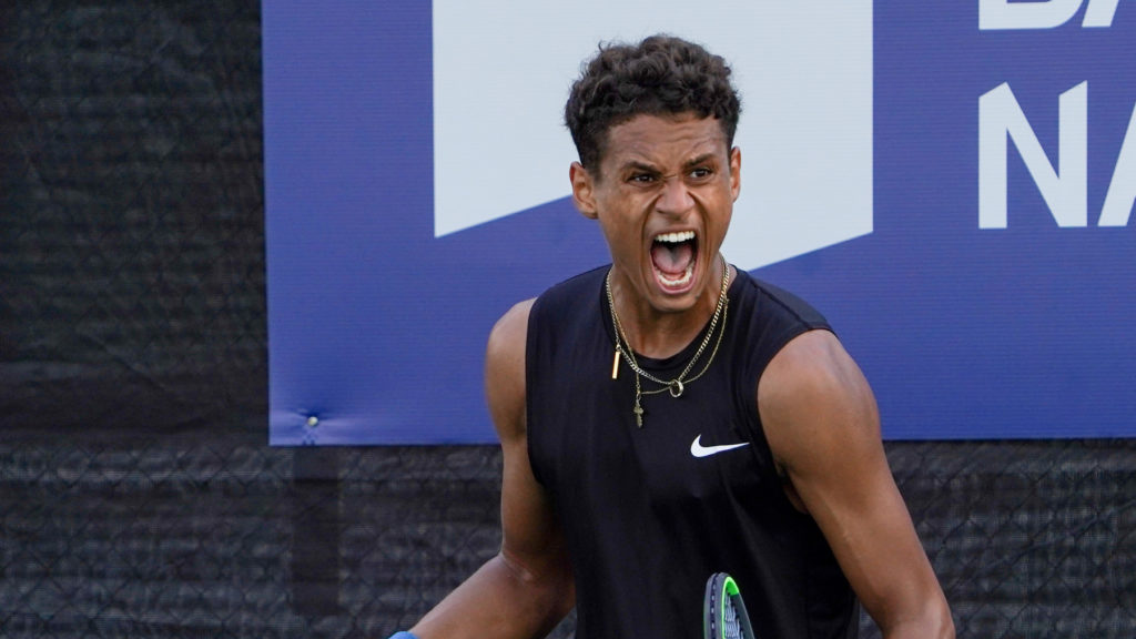 Gabriel Diallo pumps his fist and yells.