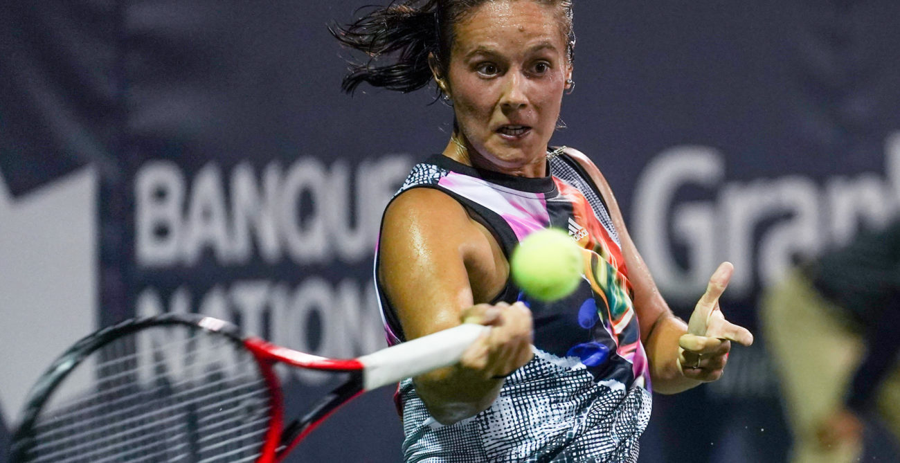 Daria Kasatkina hits a forehand.