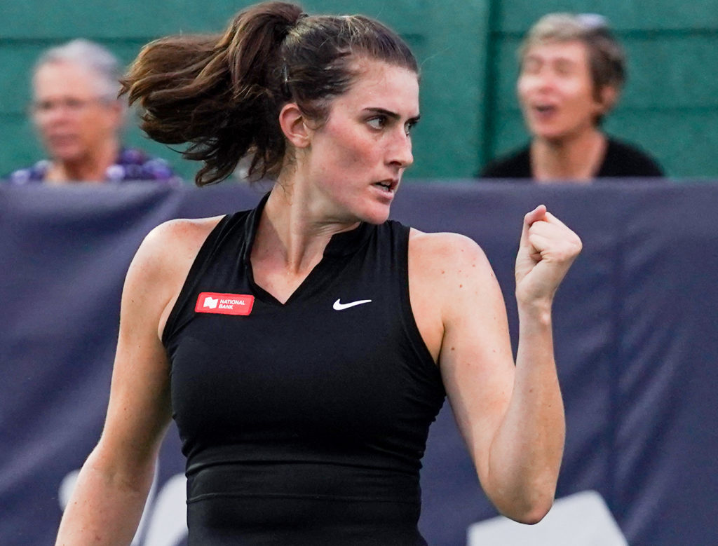 Rebecca Marino pumps her fist.