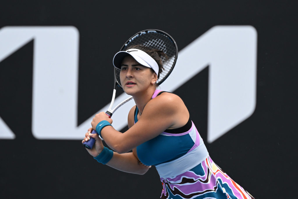 Bianca Andreescu follows through on a backhand.