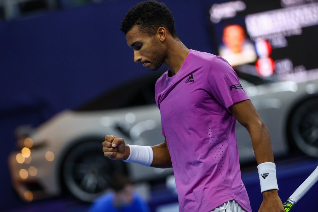 Felix Auger-Aliassime pumps his fist.