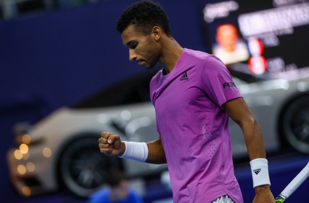 Felix Auger-Aliassime pumps his fist.