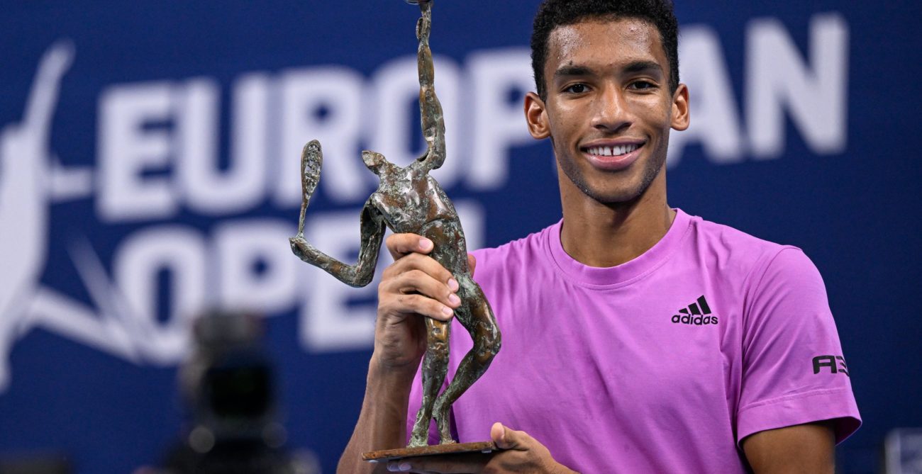 Felix Auger-Aliassime holds the European Open trophy
