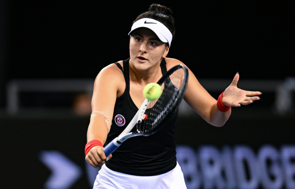 Bianca Andreescu hits a backhand.