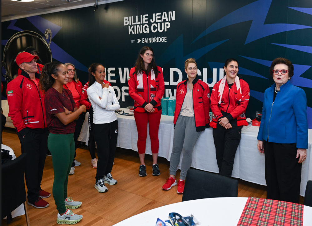 Team Canada poses for a photo with Billie Jean King.