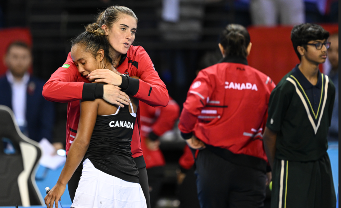 Rebecca Marino hugs Leylah Fernandez
