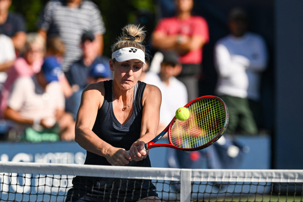 Gabriela Dabrowski hits a backhand volley.