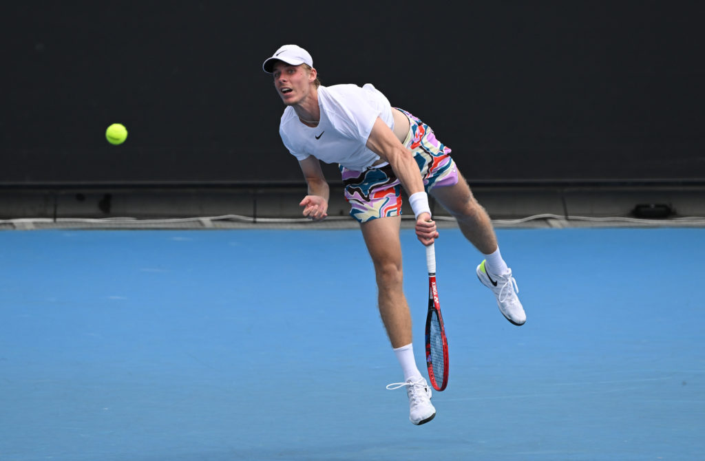Denis Shapovalov follows through on a serve.