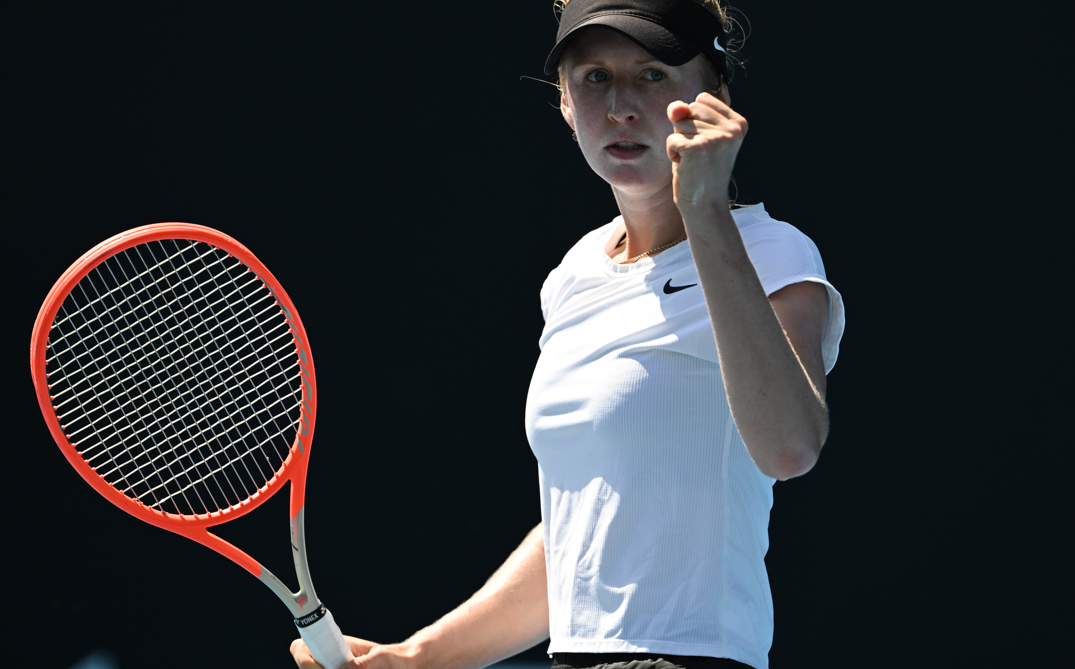 Katherine Sebov pumps her fist.