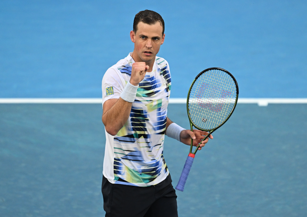 Vasek Pospisil pumps his fist.