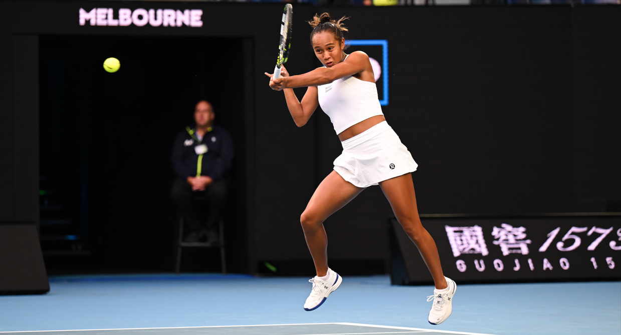 Leylah Fernandez leaps to hit a forehand.