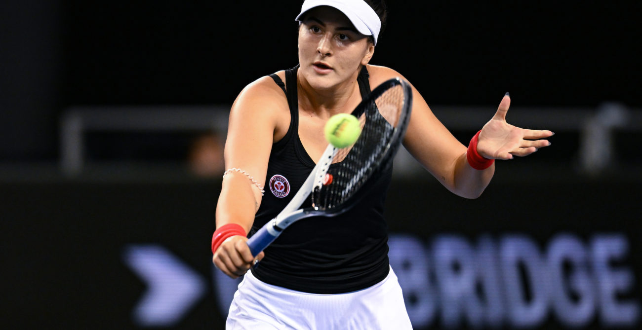 Bianca Andreescu hits a backhand volley.