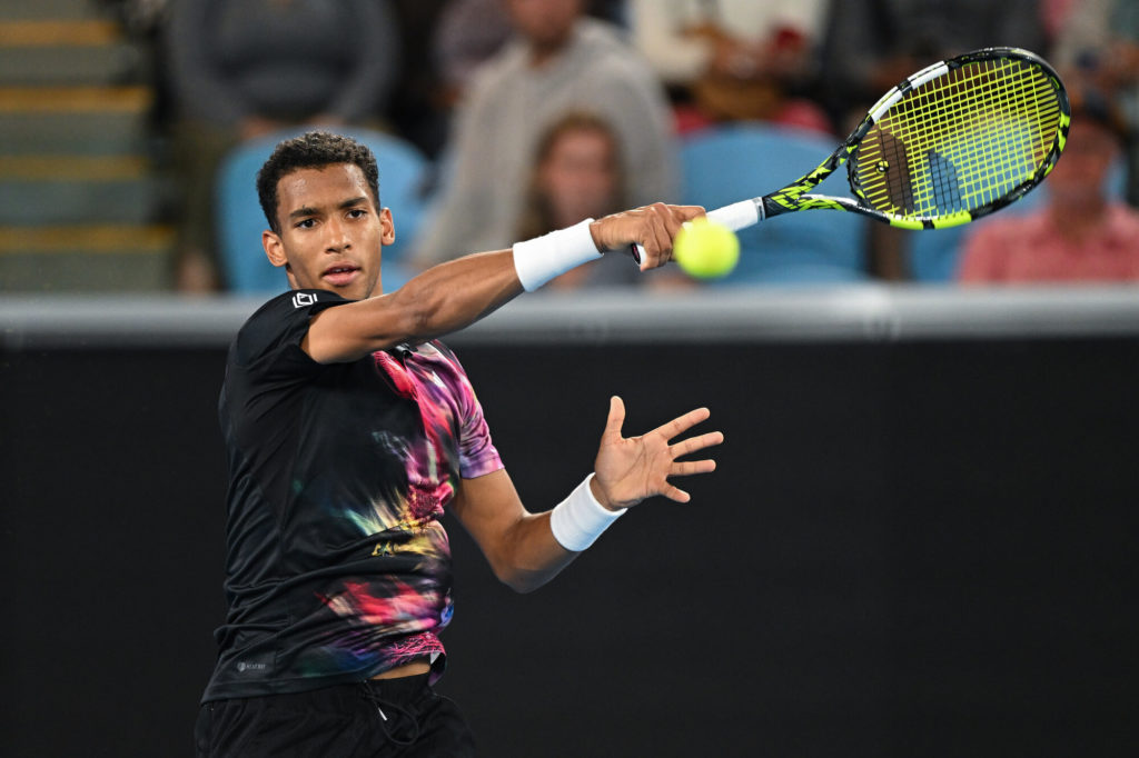 Félix Auger-Aliassime hits a forehand
