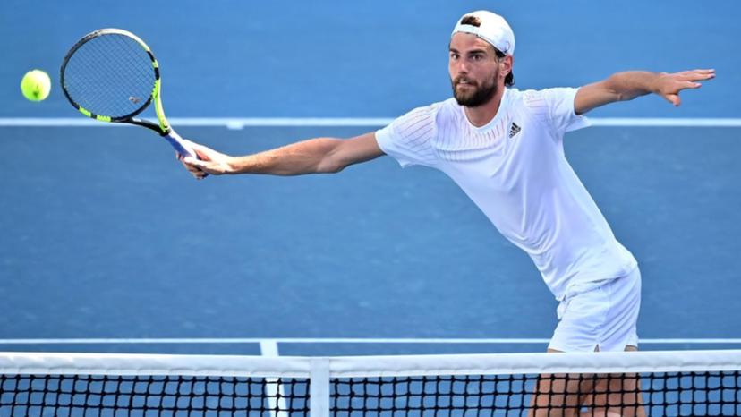 Maxime Cressy lunges for a volley.
