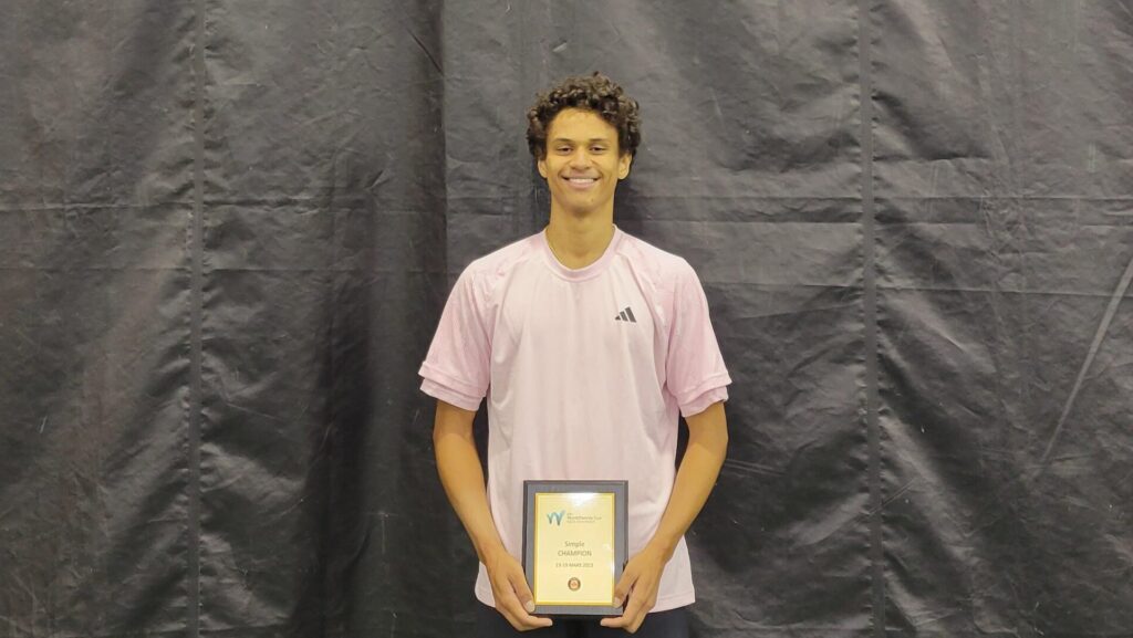 Gabriel Diallo holds his Montreal ITF trophy.