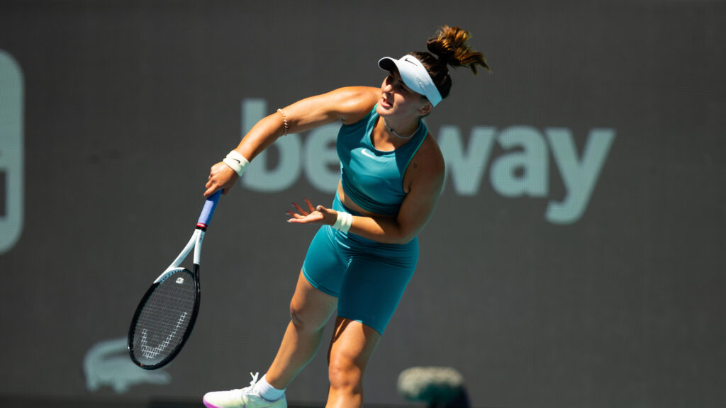 Bianca Andreescu follows through on a serve.