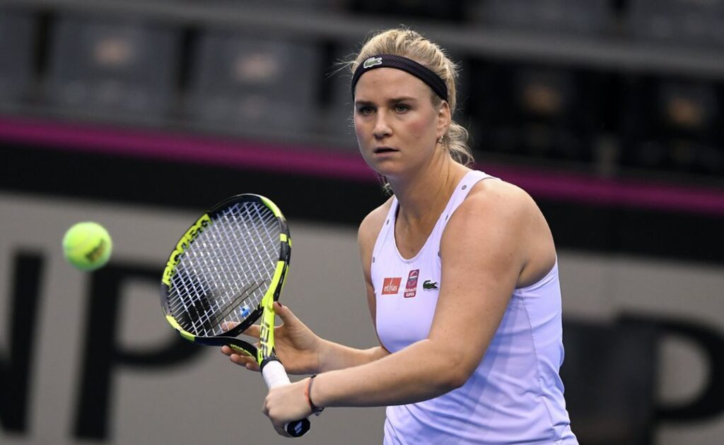 Ysaline Bonaventure hits a backhand volley.