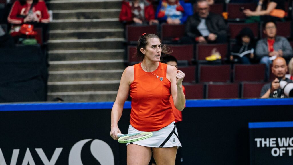 Rebecca Marino pumps her fist.