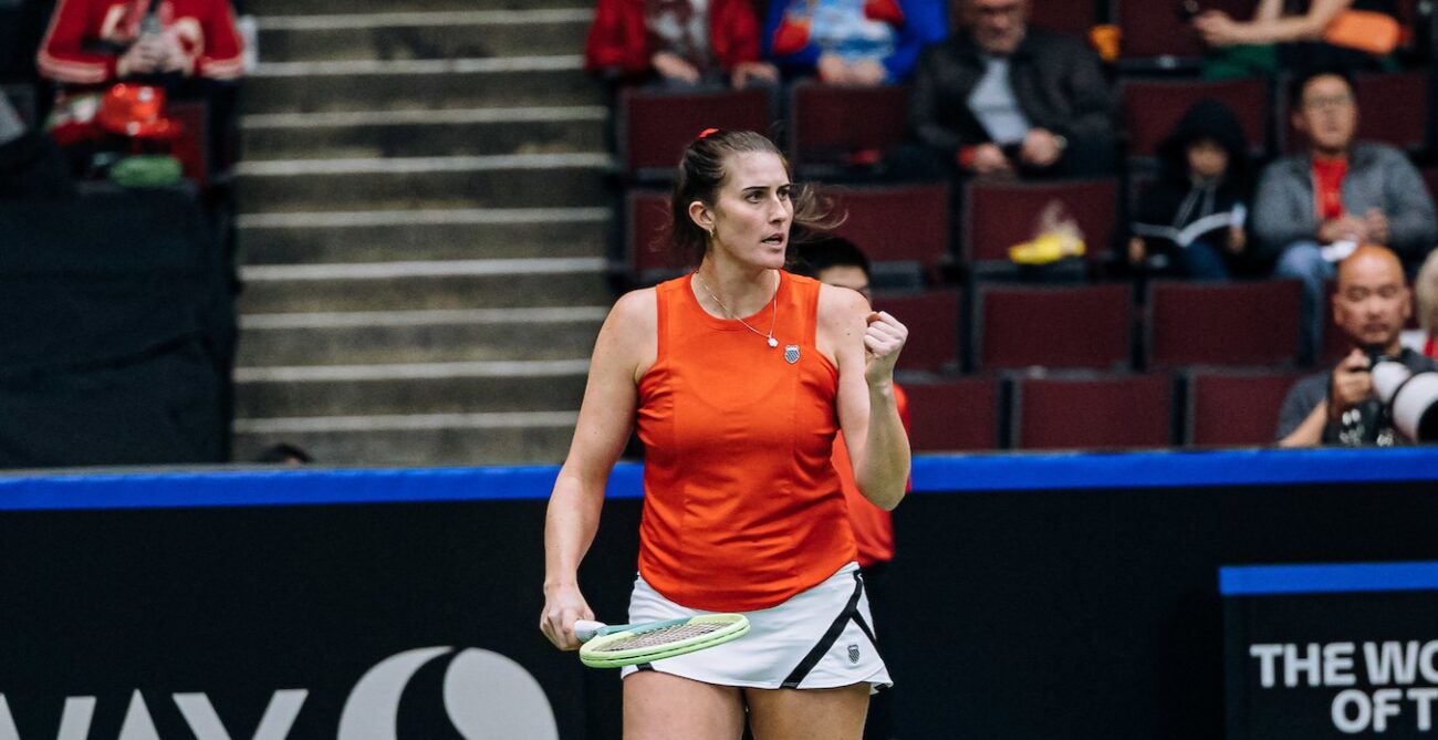 Rebecca Marino pumps her fist.