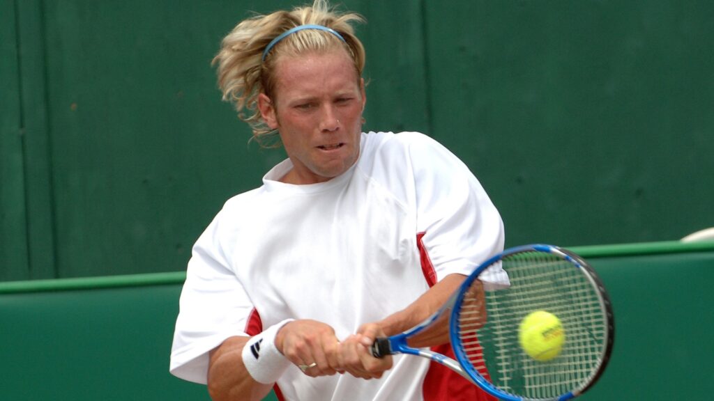 Rob Steckley hits a backhand.