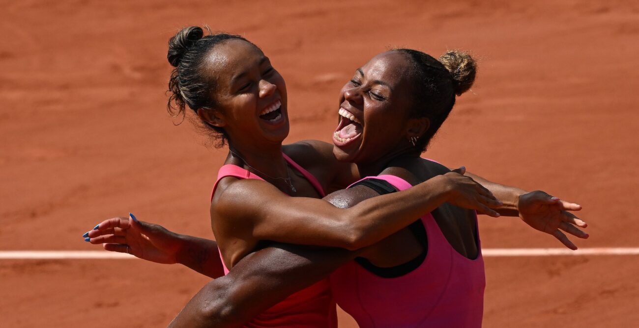 Leylah Fernandez (left) and Taylor Townsend hug.