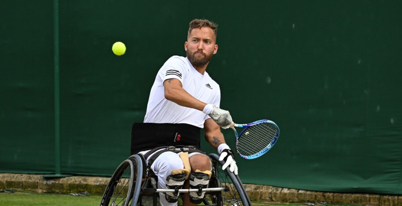 Rob Shaw prepares to hit a backhand.