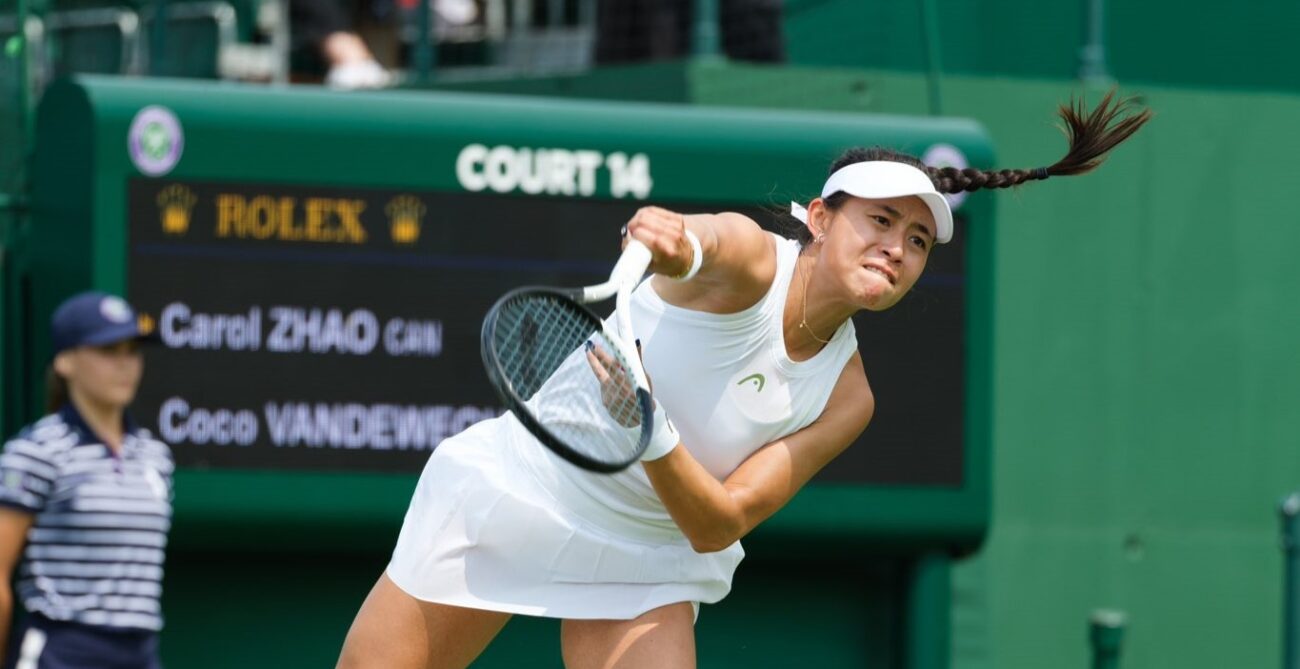 Carol Zhao follows through on a serve.